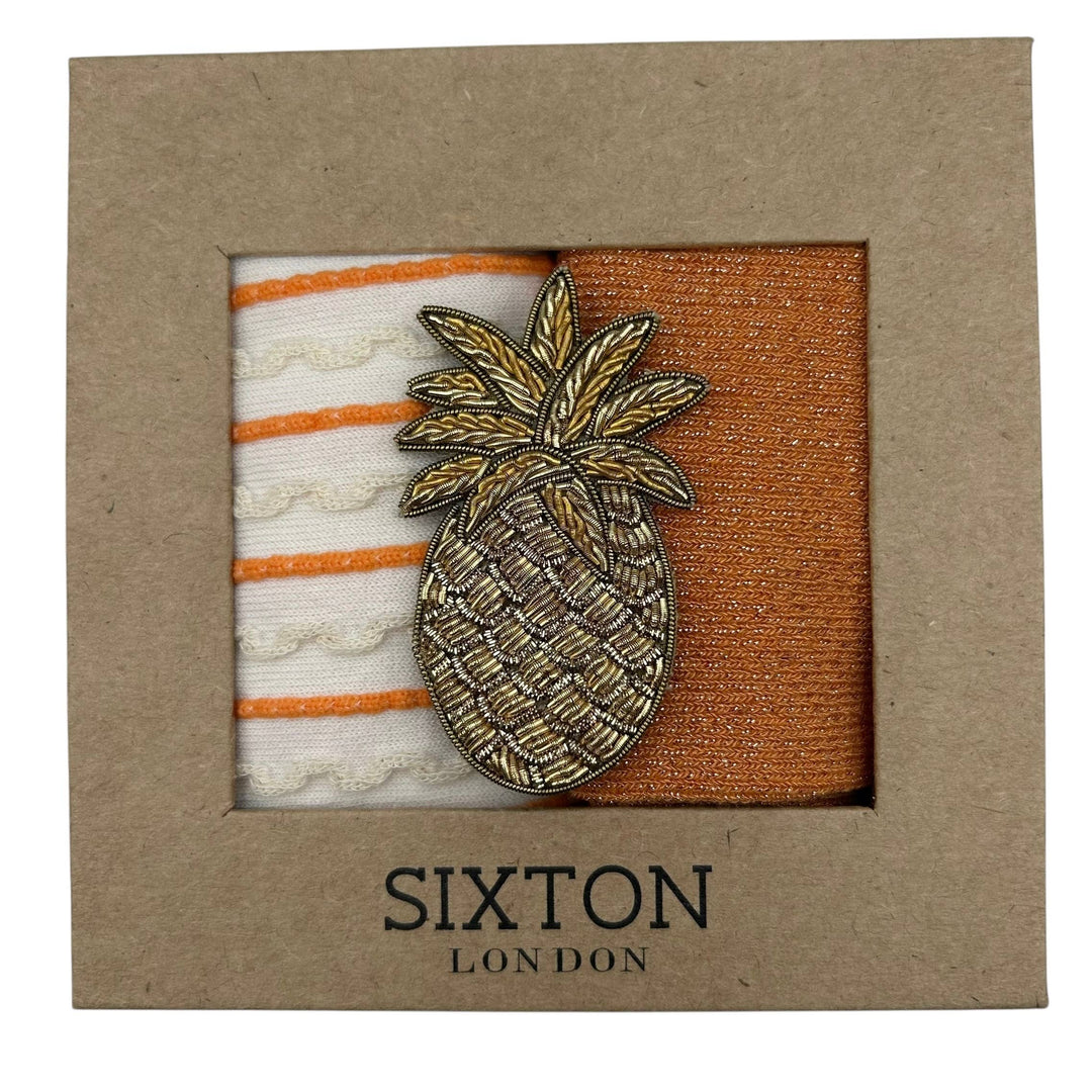 Cream Lyon & Orange Vegas sock box duo with Pineapple pin