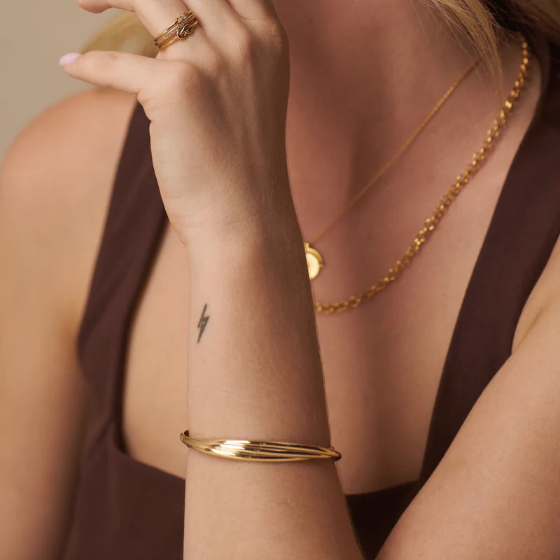 Interlocking Open Bangle Pale Gold